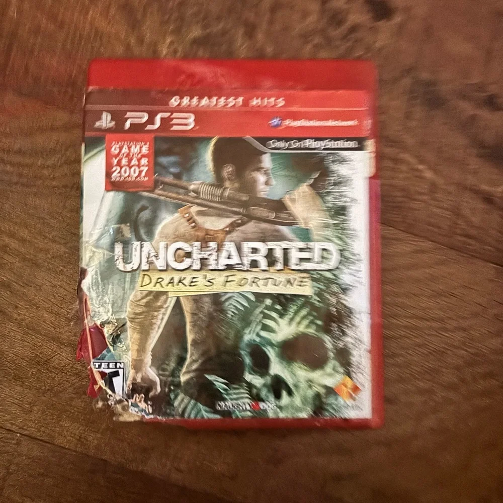 Sony Uncharted: Drake's Fortune PS3  with game manual - Red Case